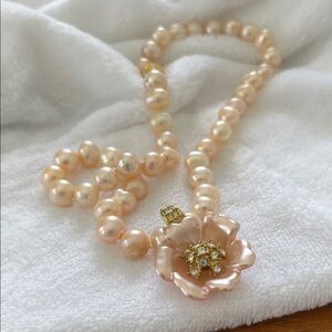 Nolan Miller Pink Pearl Necklace with Gold Floral Pendant